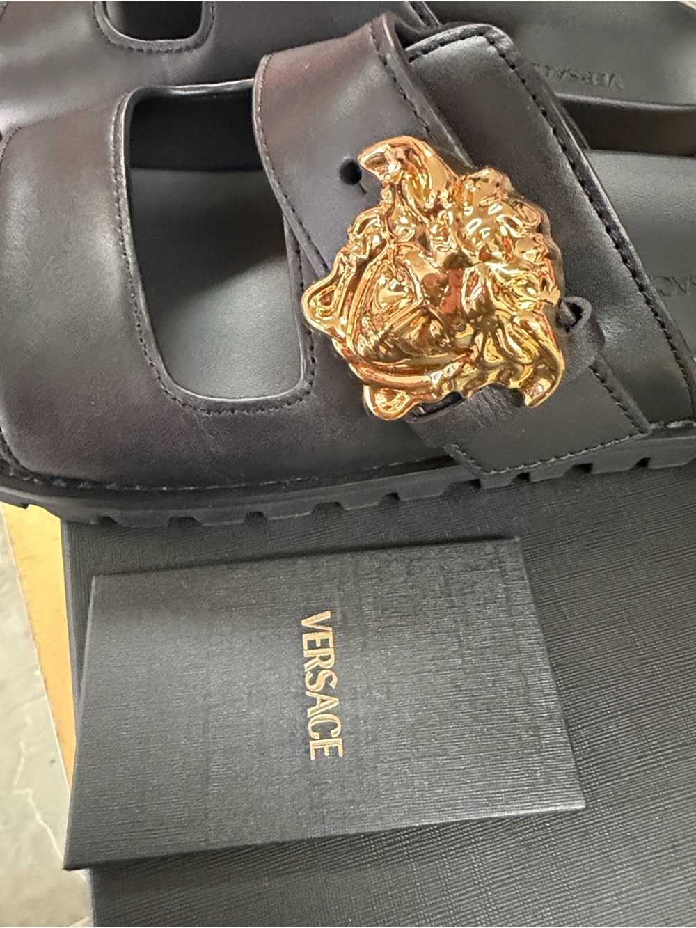 Versace Black Leather Double-Strap Men’s Slide Sandals with Gold Medusa Accent